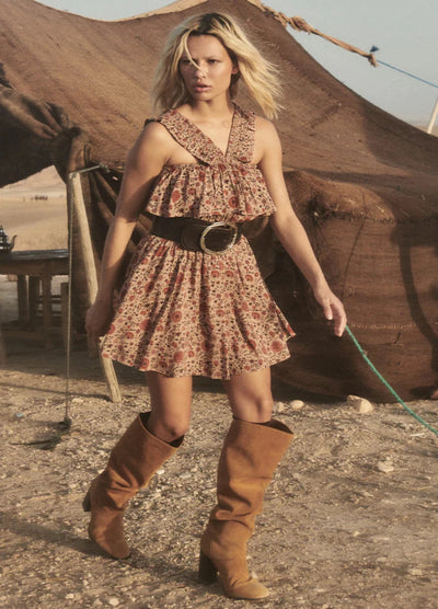 Model wearing the Lady Untamed Frill Tea Dress in Tea Leaf Print from Spell