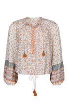 Sunshine Bandit Blouse in Desert Sage paired with blue wash jeans