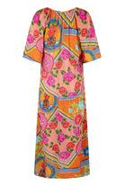 Colorful dress with floral and abstract patterns on a white background