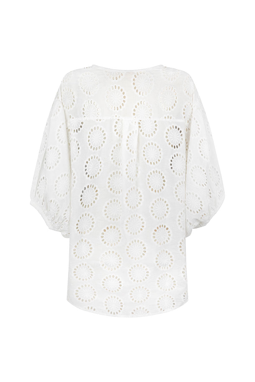 White lace top on a white background