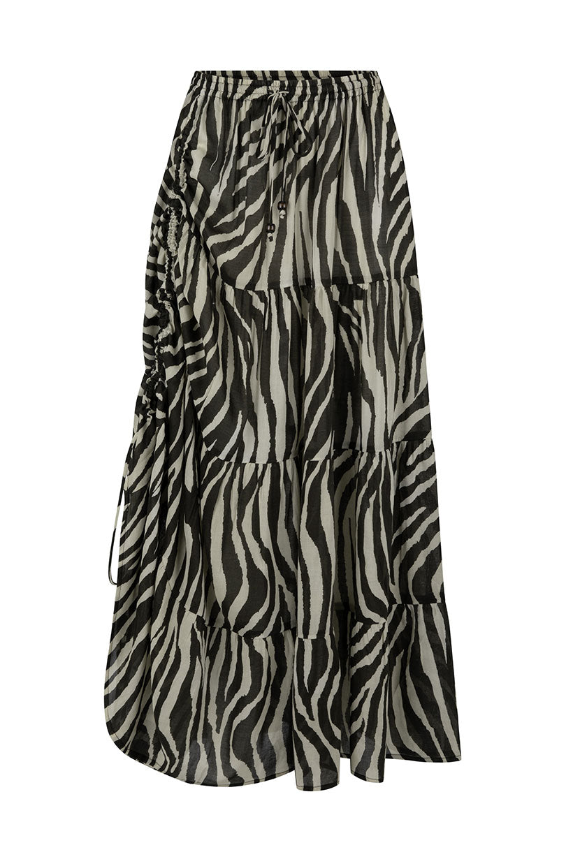 Zebra print tiered skirt on a white background