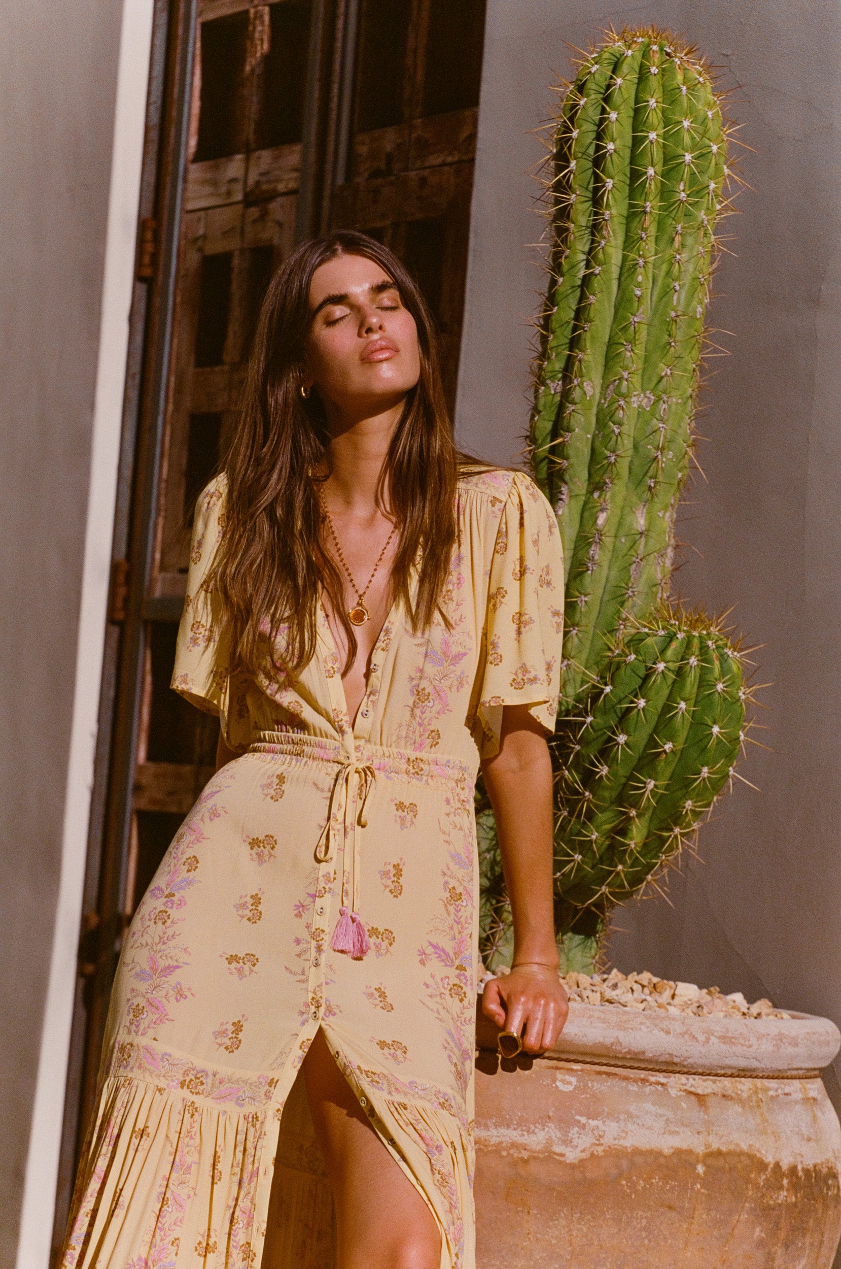 Yellow floral maxi dress with button through details and elasticated ties