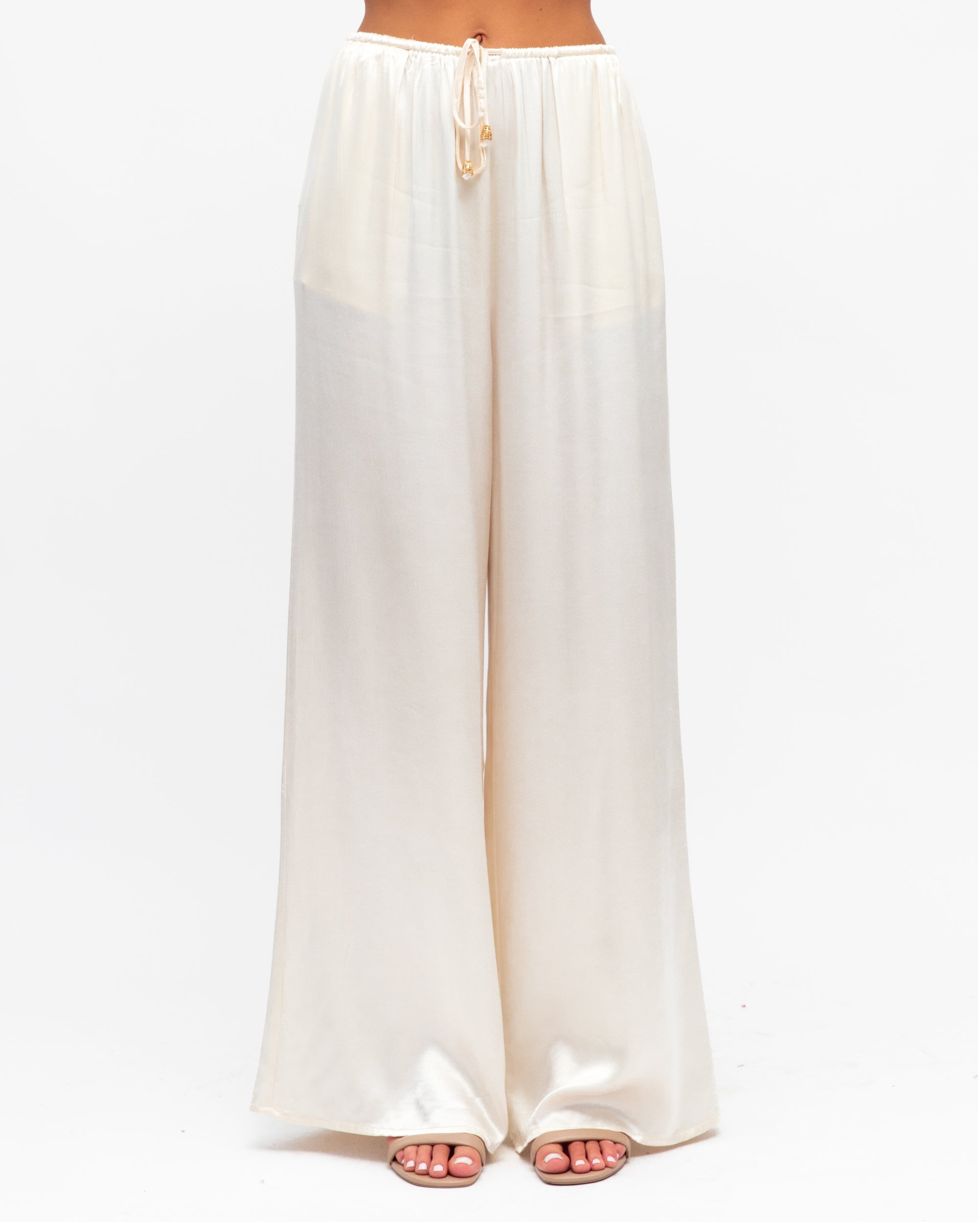 White wide-leg pants on a white background
