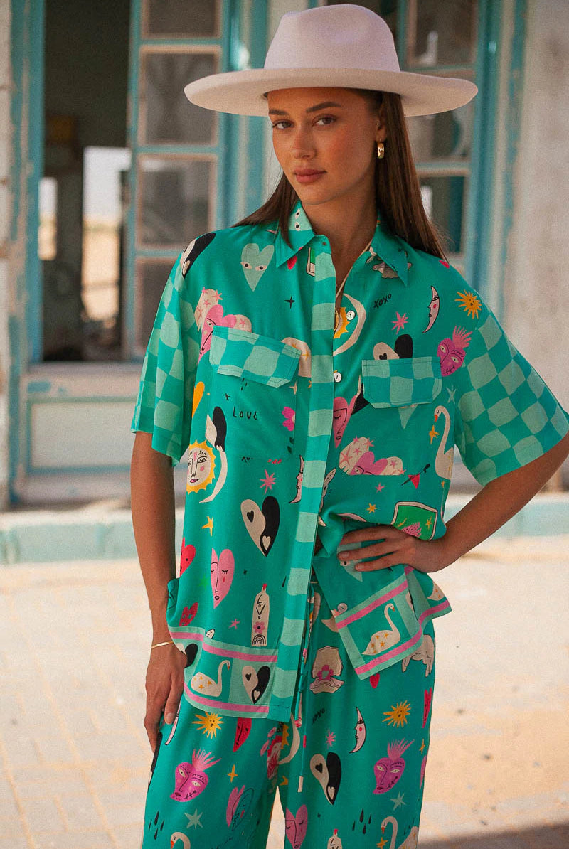 Turquoise short sleeve blouse with motif print in eco rayon