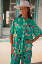 Turquoise short sleeve blouse with motif print in eco rayon