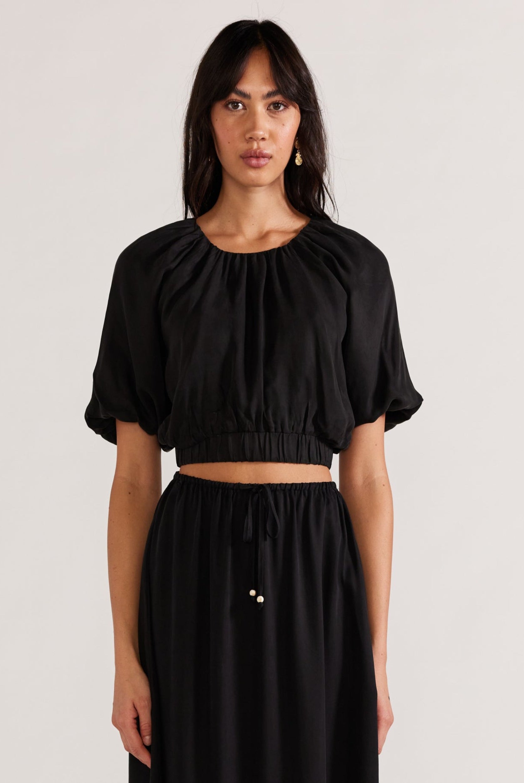 Black cropped top with matching skirt in cupro fabric from Staple the Label