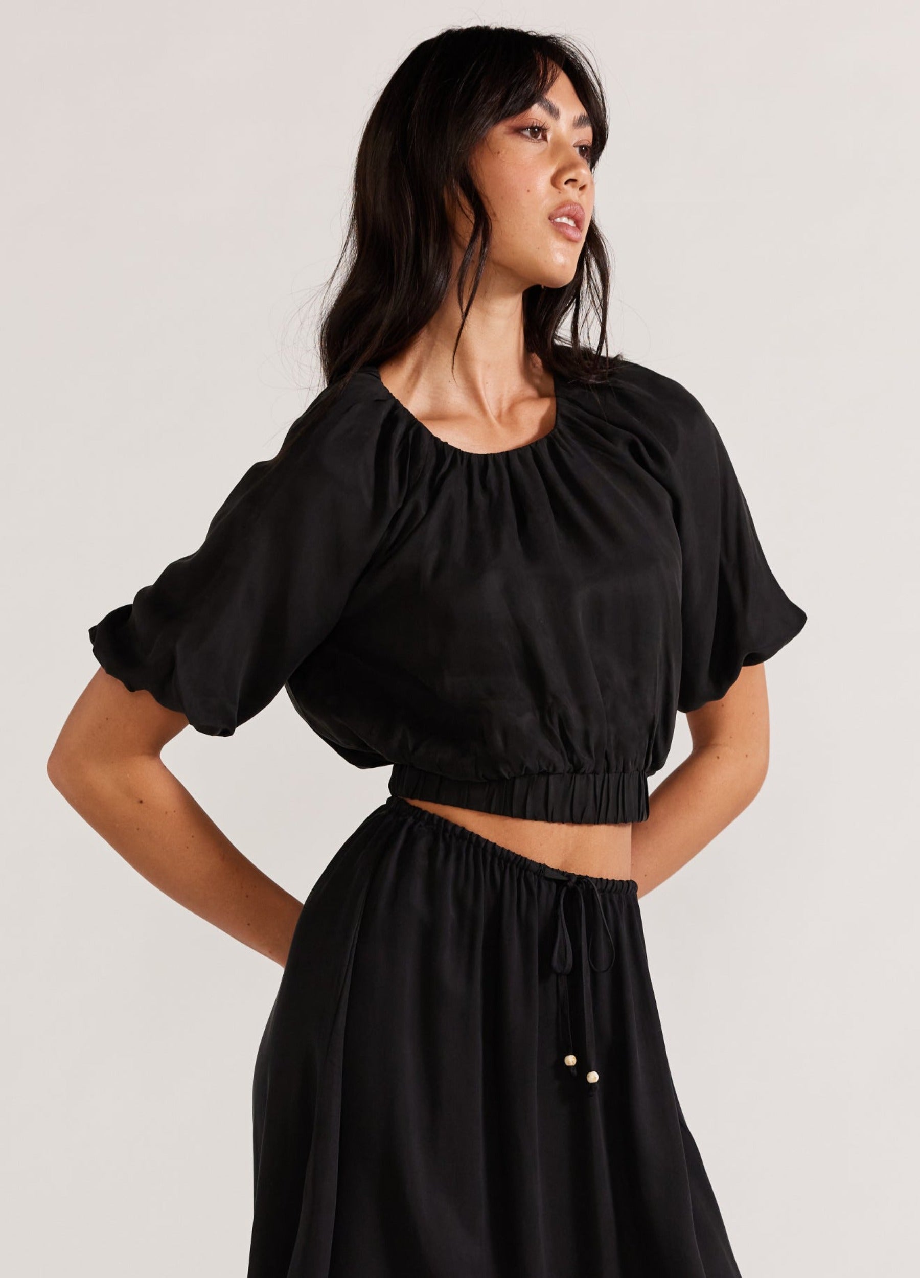 Black cropped top with matching skirt in cupro fabric from Staple the Label