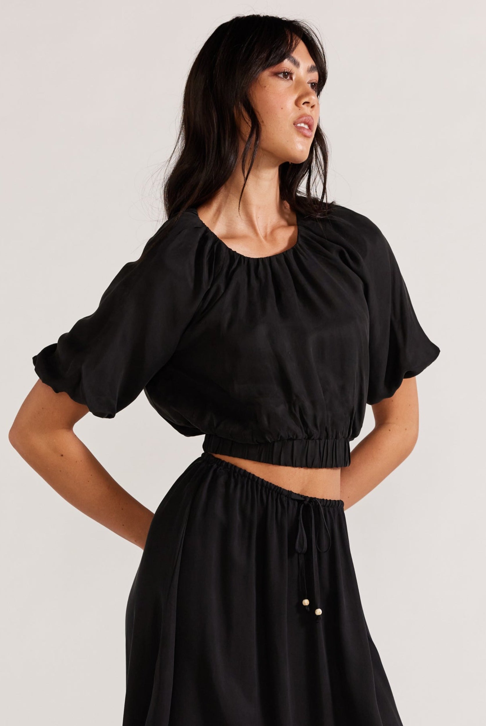 Black cropped top with matching skirt in cupro fabric from Staple the Label