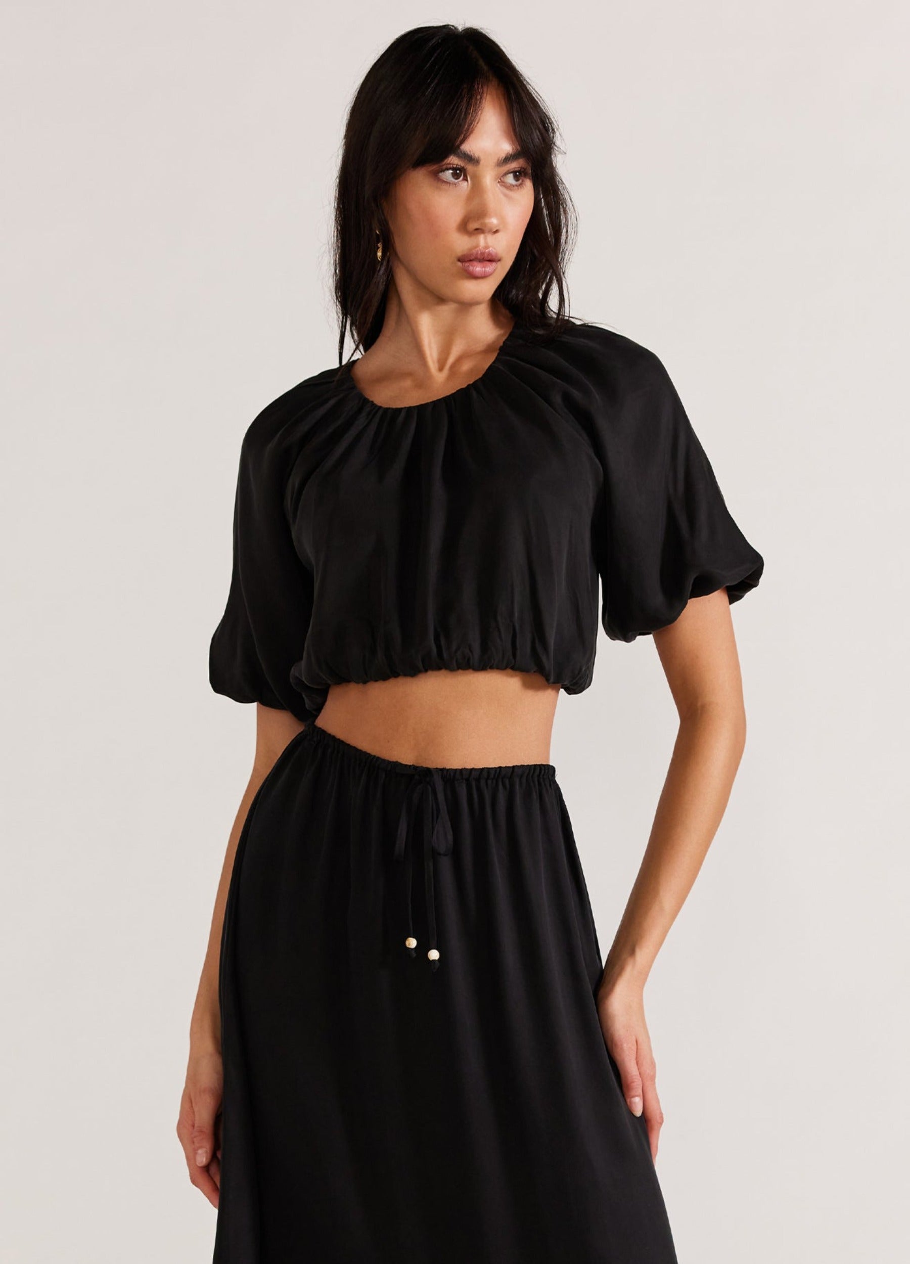 Black cropped top with matching skirt in cupro fabric from Staple the Label