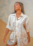 Neutral and white printed shorts in shell print from sustainable brand Palm Collective