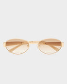 Gold sunglasses with a reflective surface on a white background