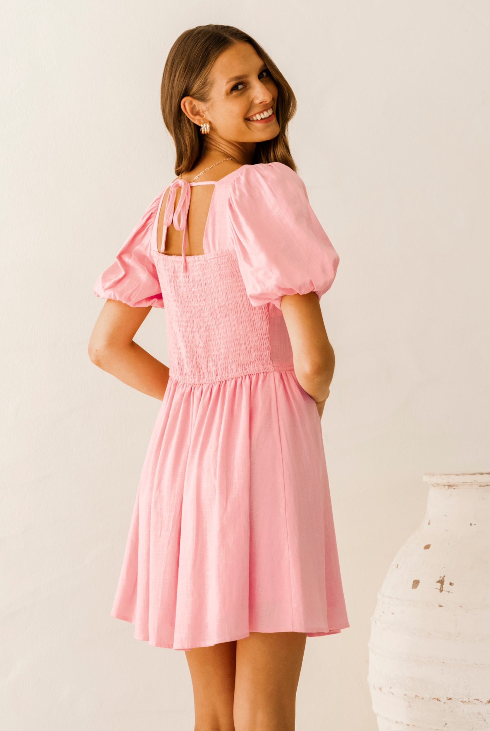 Model wearing Paper Heart Pink Mini Dress from Paper Heart
