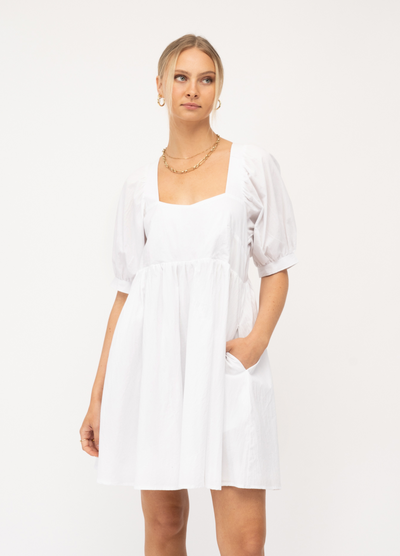 Model wearing Paper Heart white Sonia dress with pockets