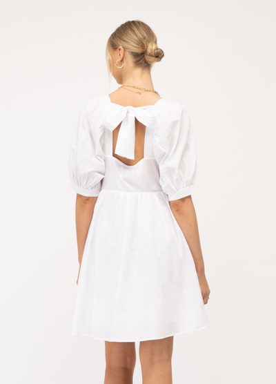 Model wearing Paper Heart white Sonia dress with pockets