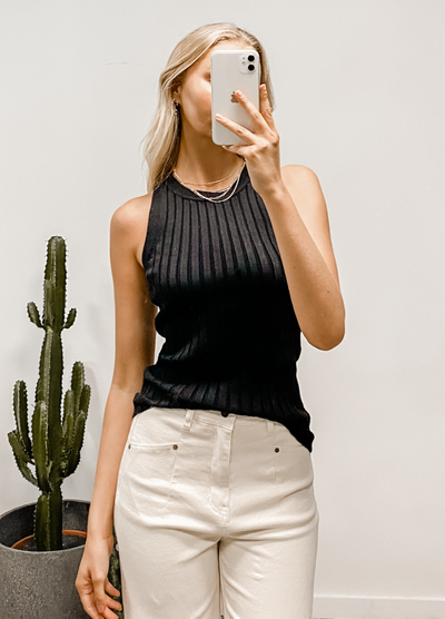 Model wearing the ribbed viscose nylon thea tank from australian fashion brand paper heart in black colourway