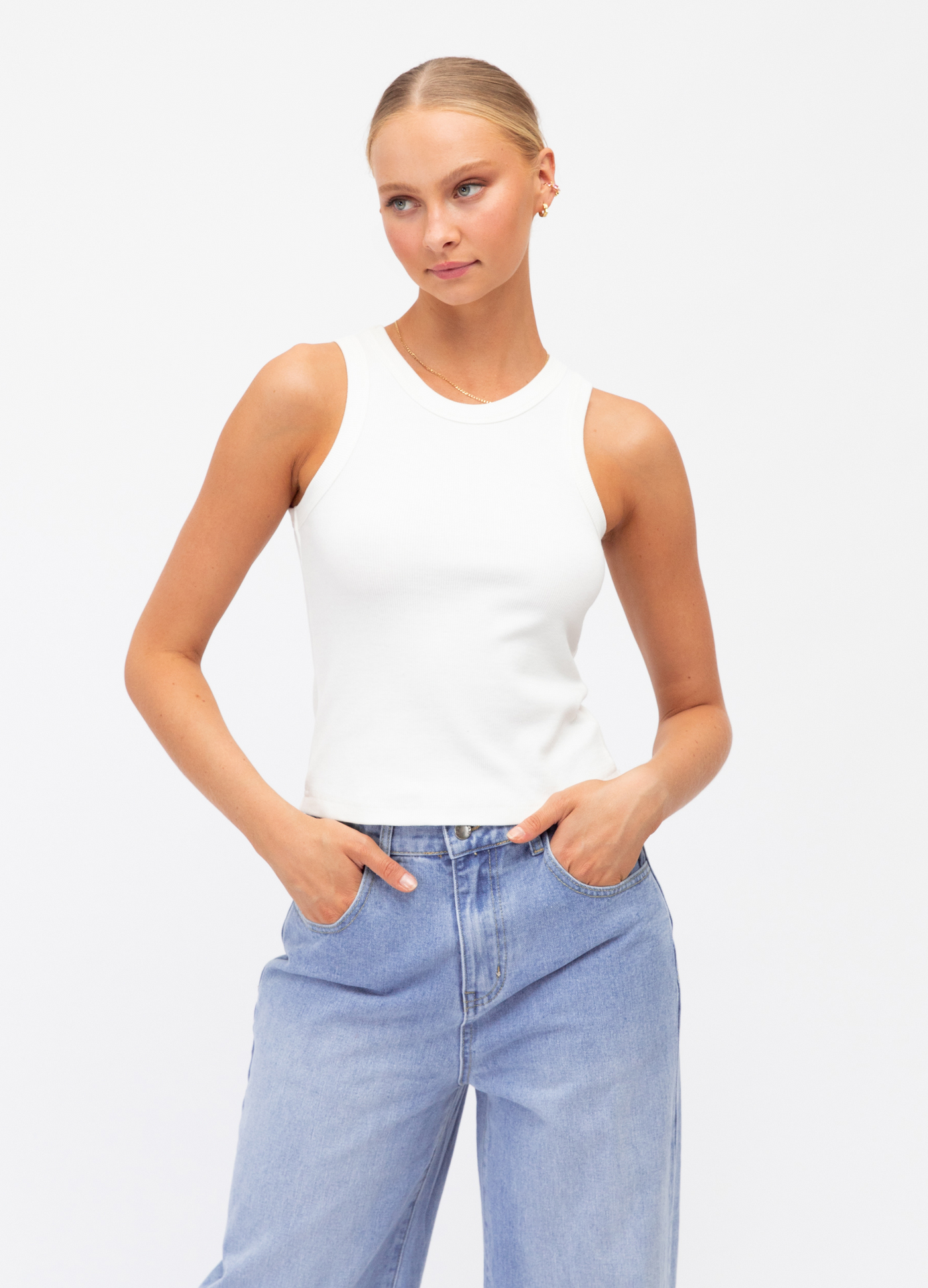 Model wearing the Paper Heart Summer tank in white 
