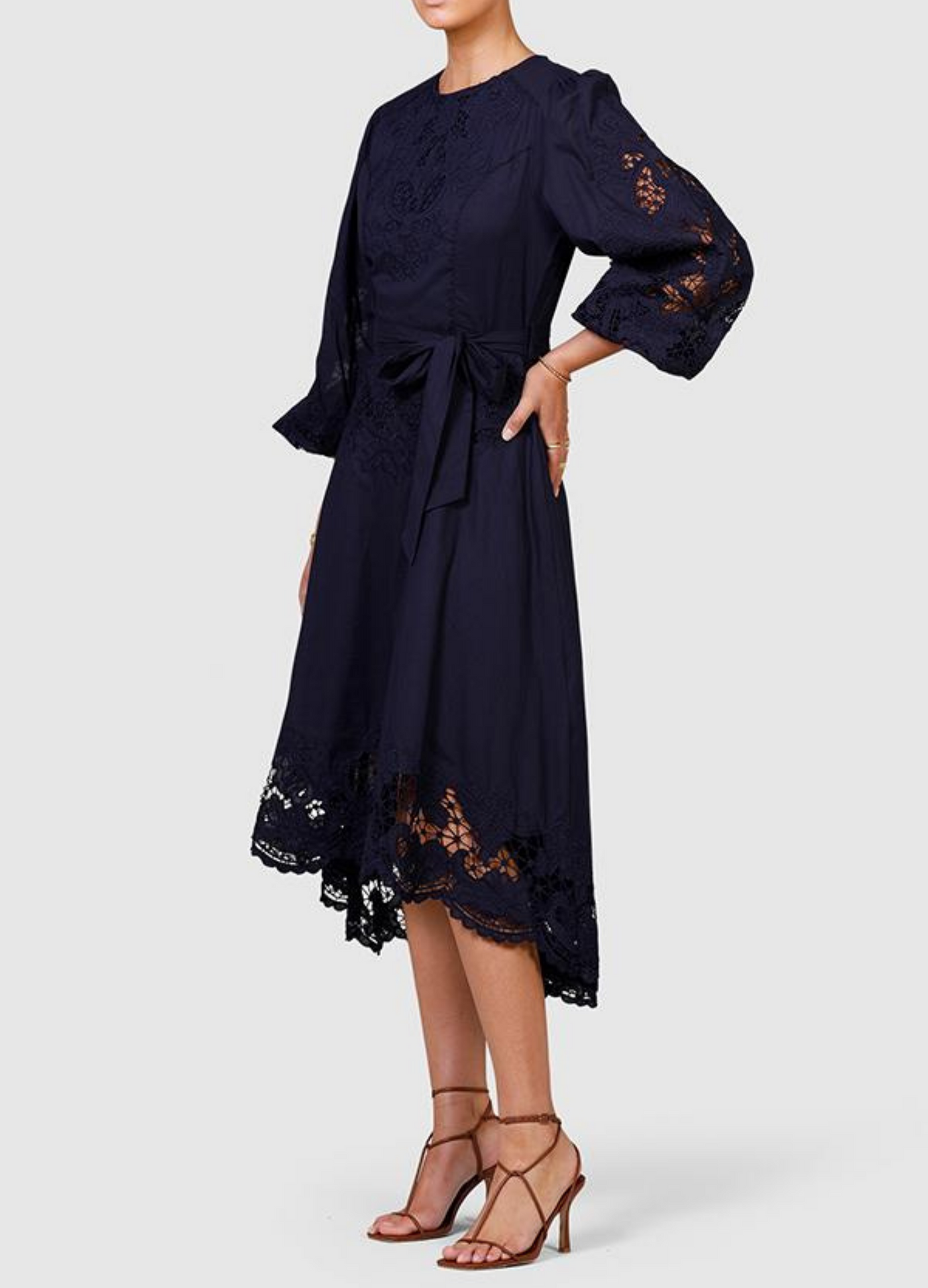 Model wearing navy blue midi dress from ministry of style