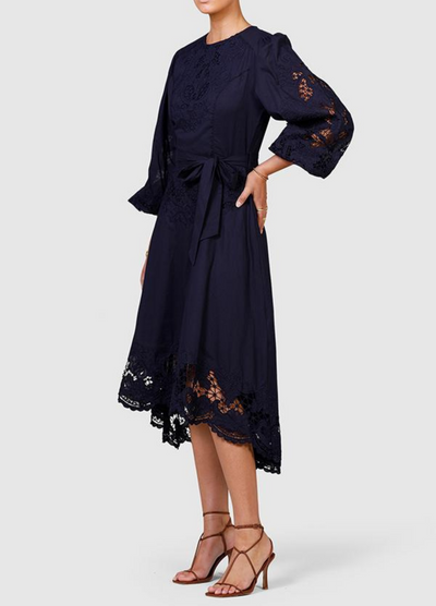 Model wearing navy blue midi dress from ministry of style