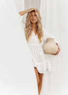 White ruffle detail tiered mini dress with self ties