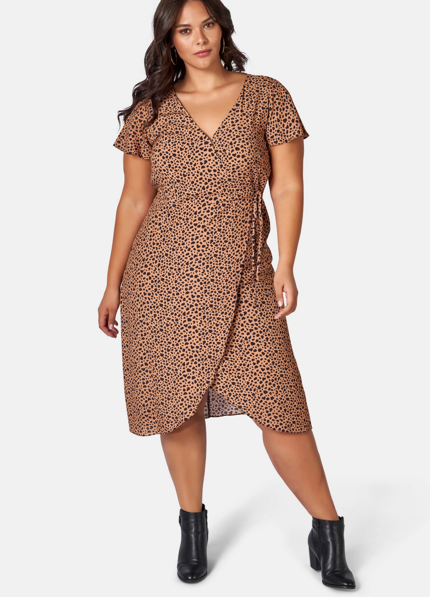 Brunette Woman wearing animal print wrap dress