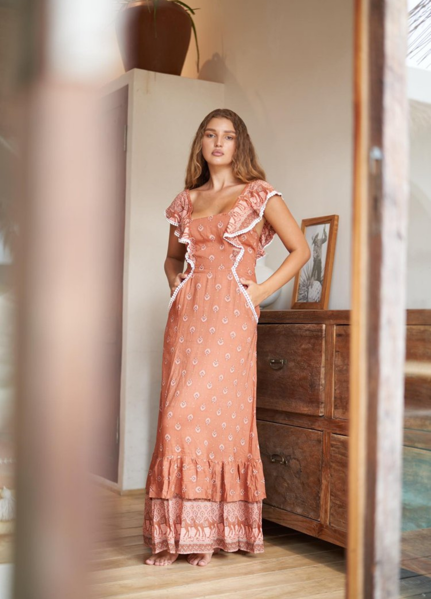 Terracotta colour printed maxi dress with double frill hem and back tie with ruffle shoulders