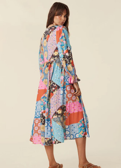 Model wearing the jewel print cha cha boho midi dress
