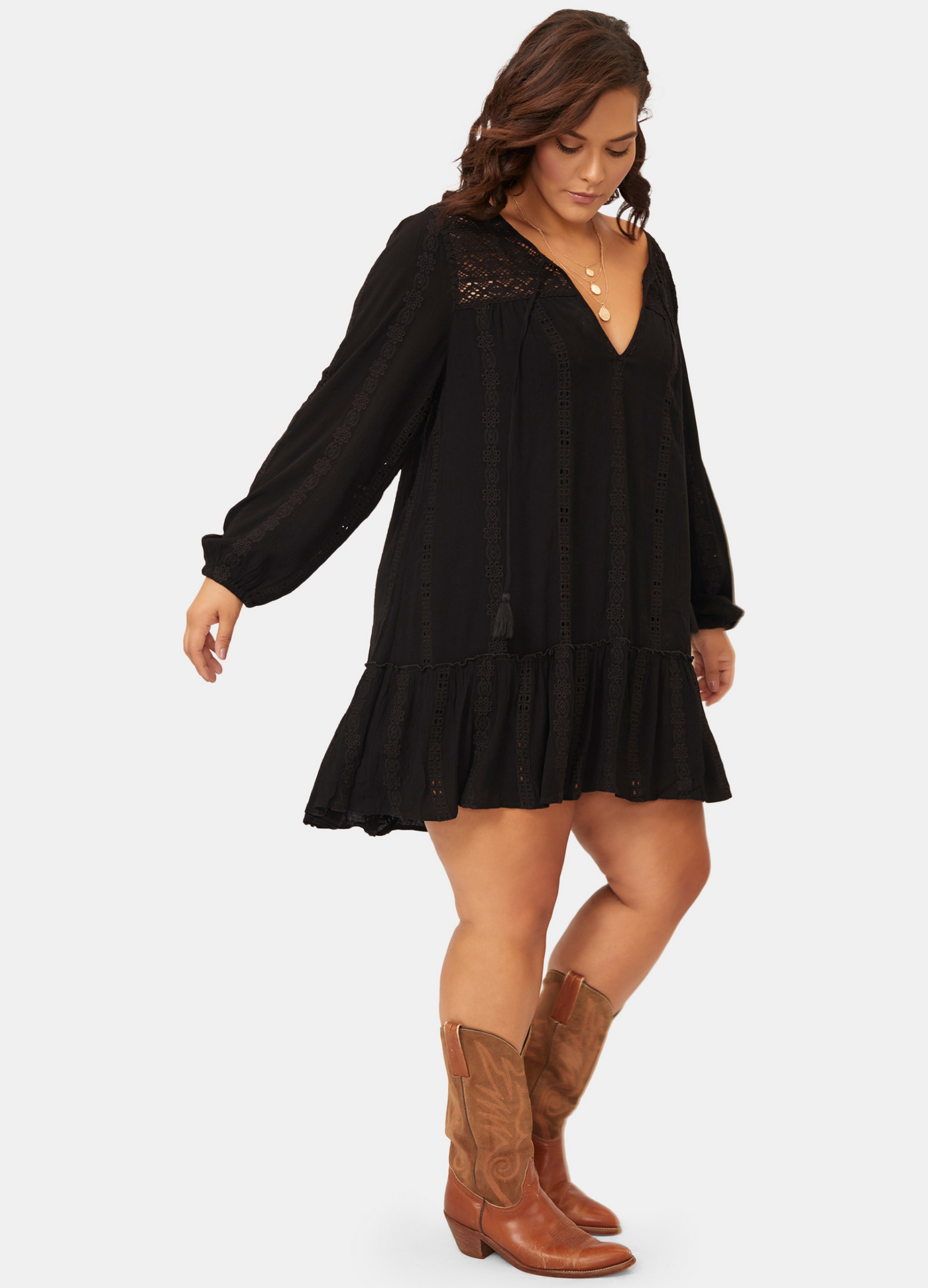 Woman wearing black boho detail curve fit mini dress