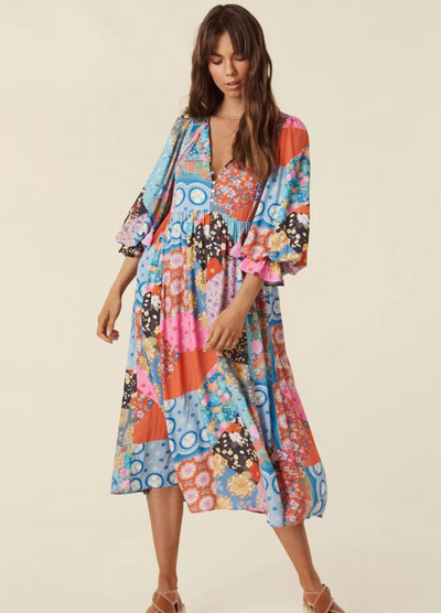 Model wearing the jewel print cha cha boho midi dress