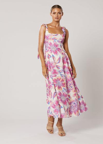Model wearing the Audra floral print Dress in pretty pink print
