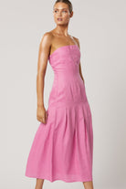 Model wearing strapless pink breathable fabric occasion dress