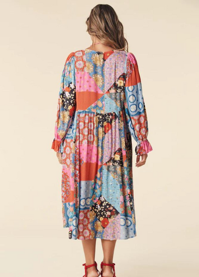 Model wearing the jewel print cha cha boho midi dress