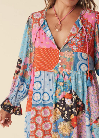 Model wearing the jewel print cha cha boho midi dress