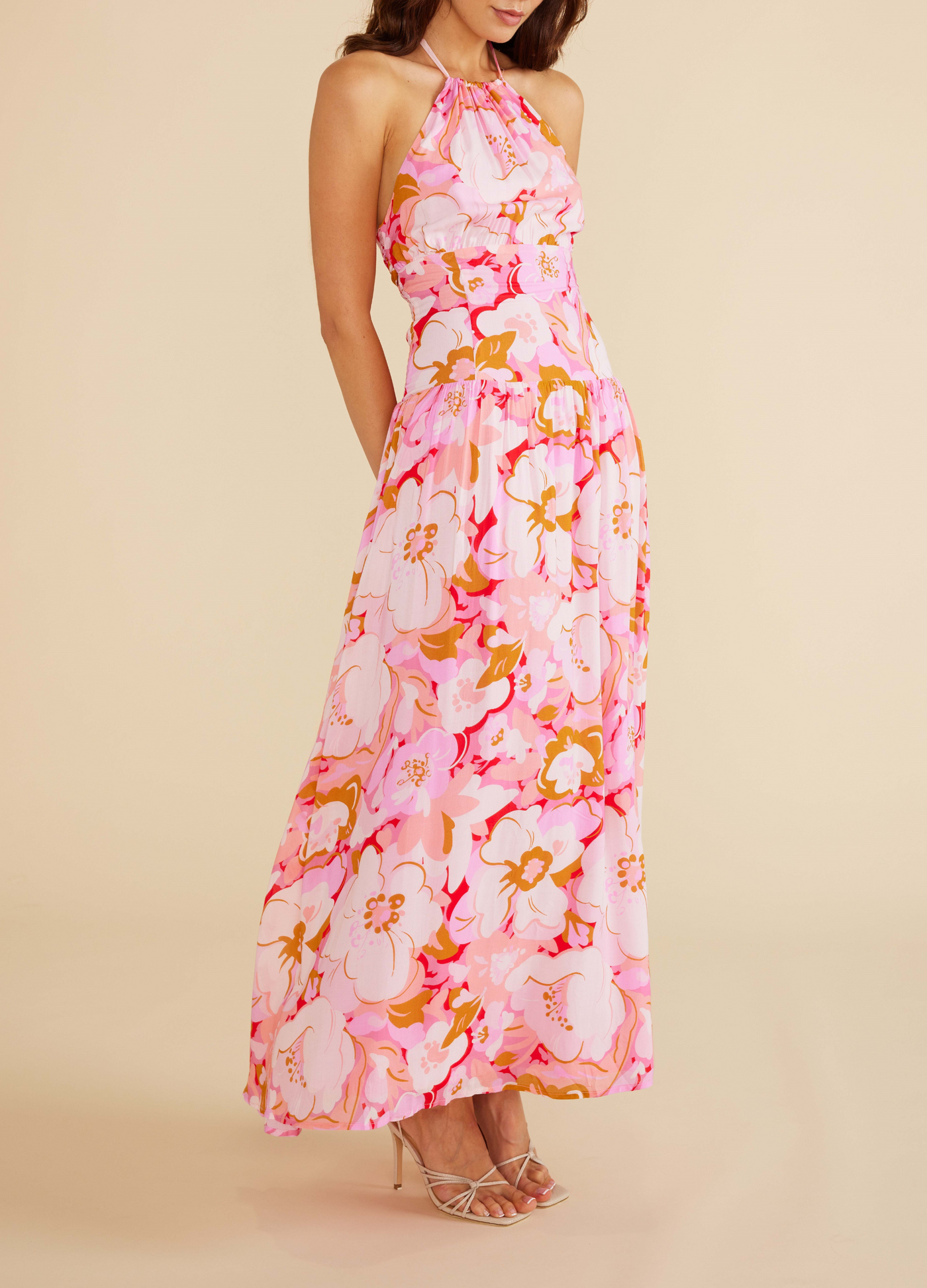 Model wearing the Amina Halterneck dress in floral print