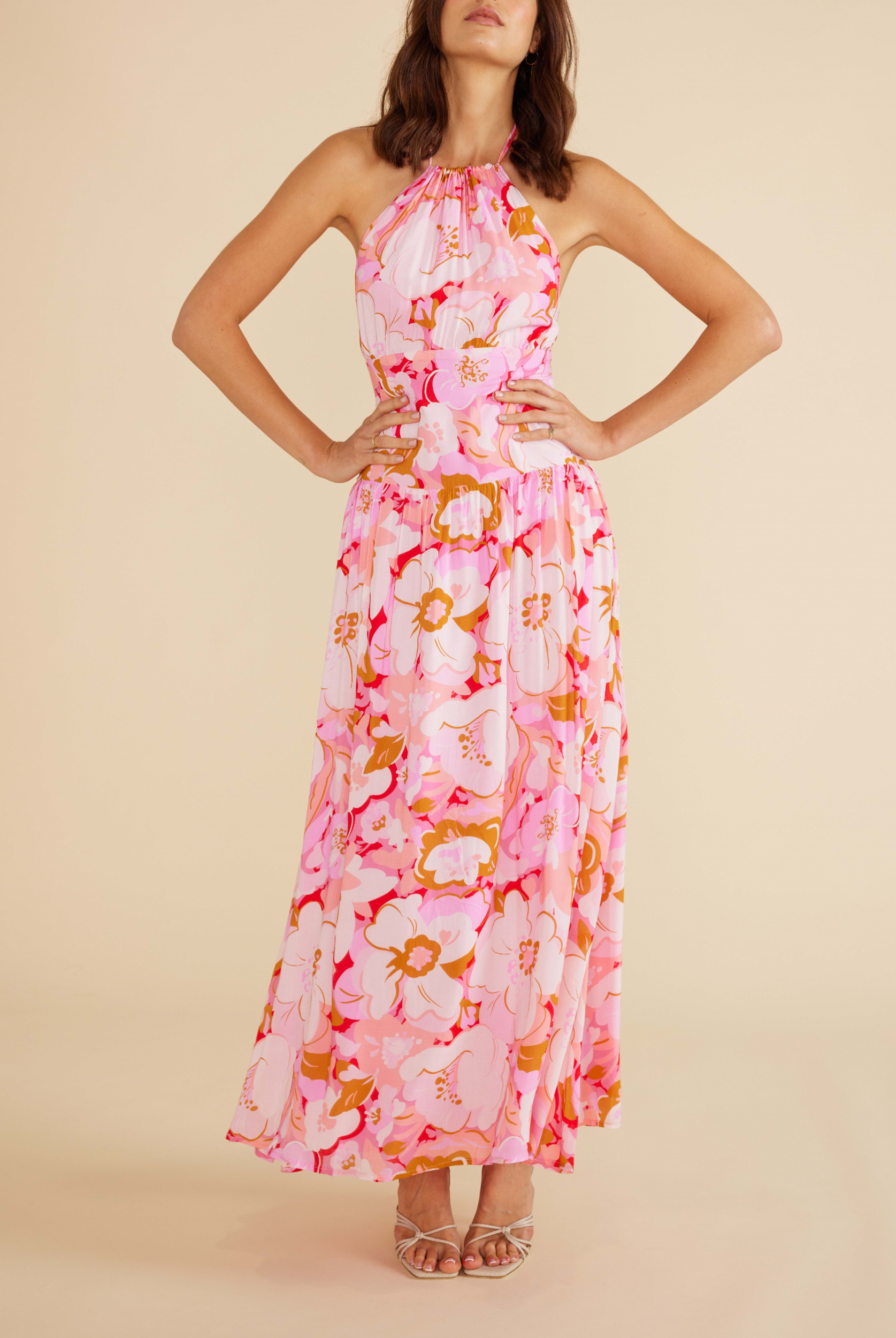 Model wearing the Amina Halterneck dress in floral print