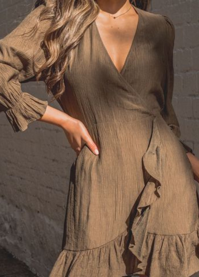 Model wearing a khaki green wrap dress