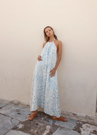 Model wearing the blue and white tamra maxi dress