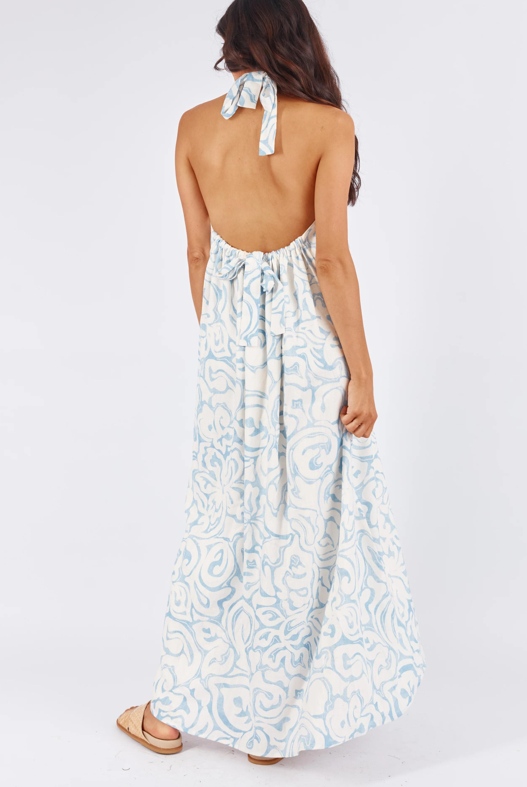 Model wearing the blue and white tamra maxi dress