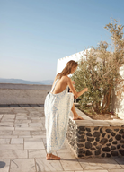 Model wearing the blue and white tamra maxi dress