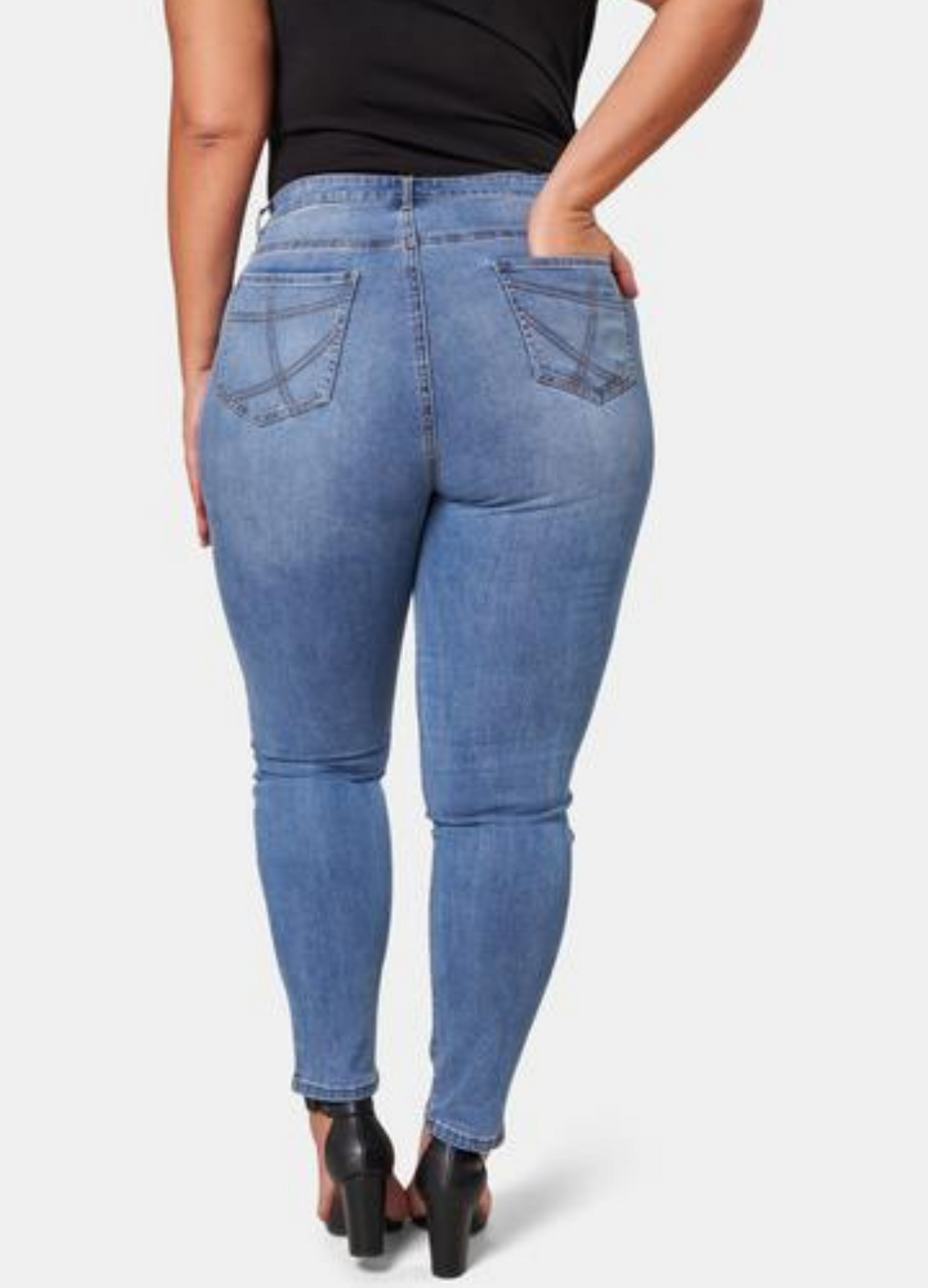 Model wearing the Kylie Skinny  Jean in Mid Wash