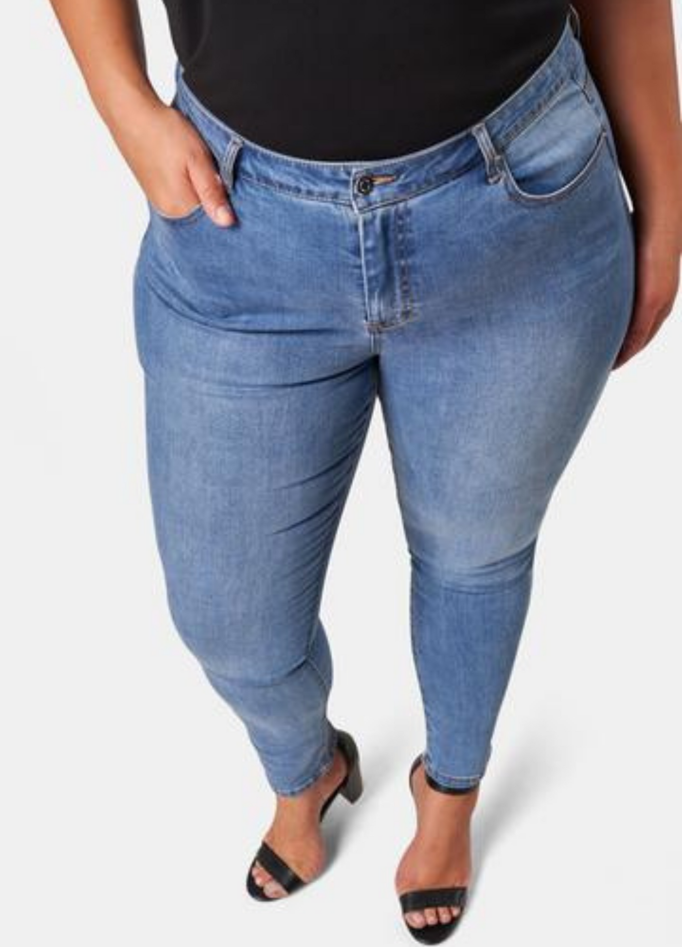 Model wearing the Kylie Skinny  Jean in Mid Wash