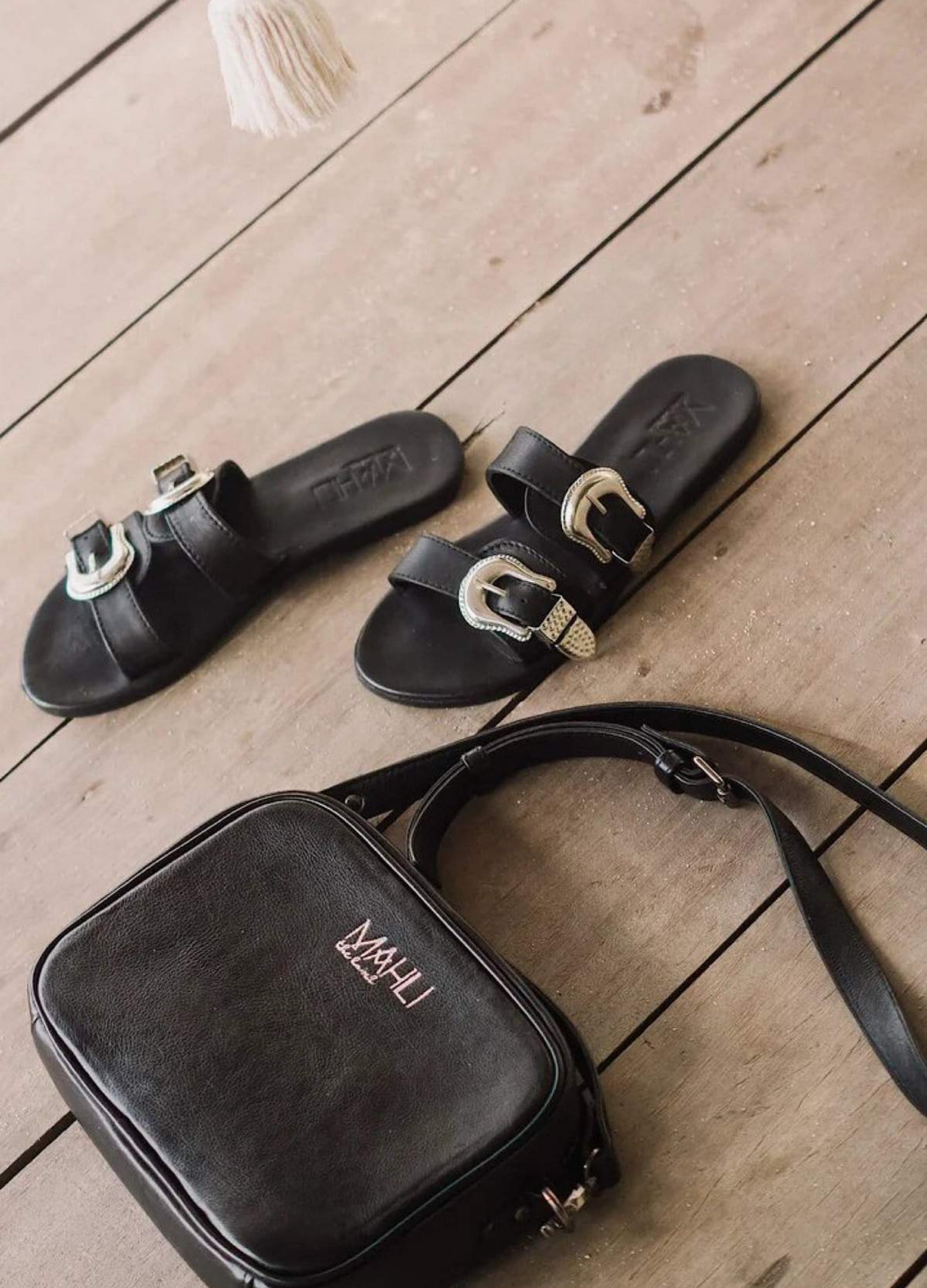 Model wearing the texan buckle slides