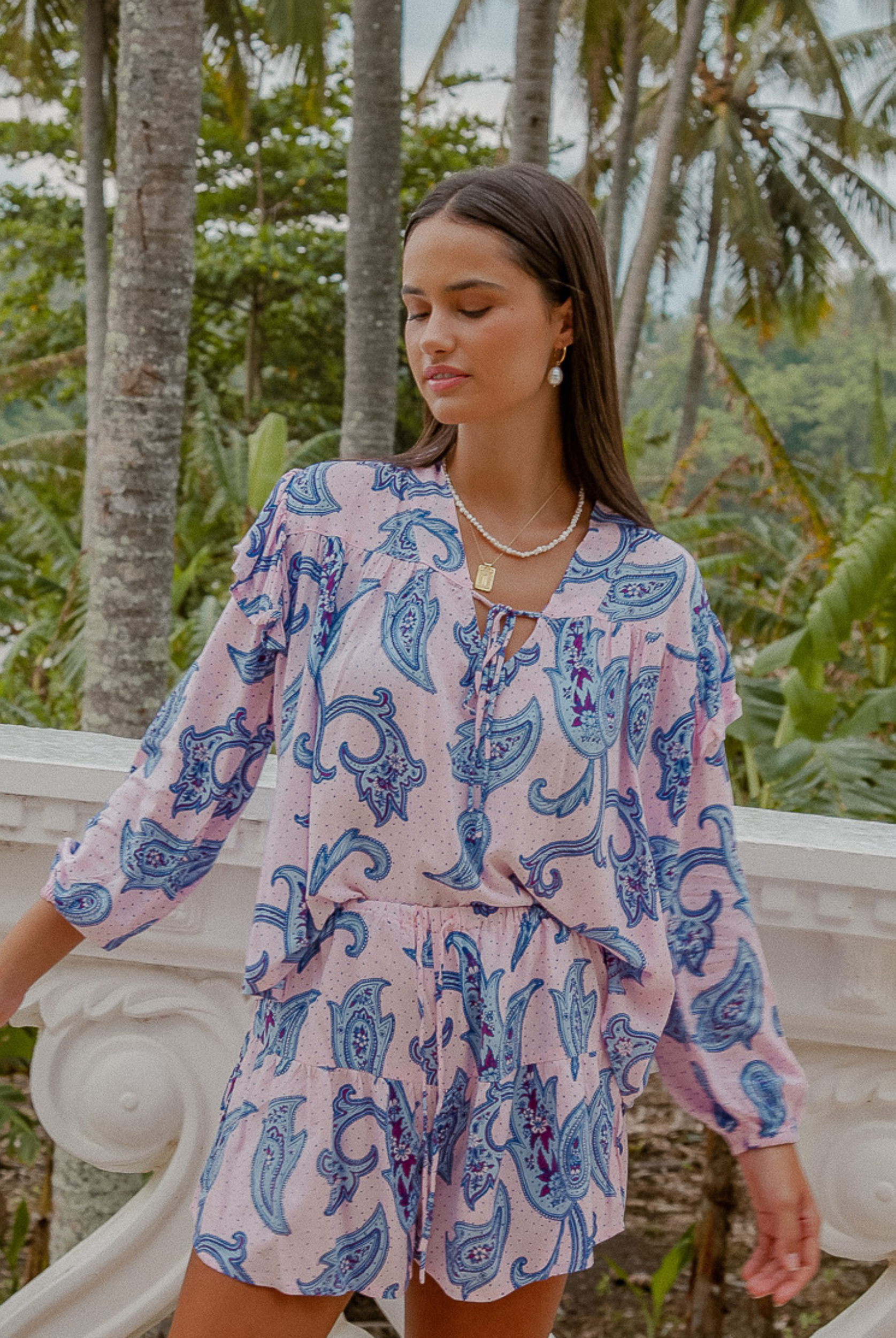 Model wearing the Oasis Paisley Blouse 