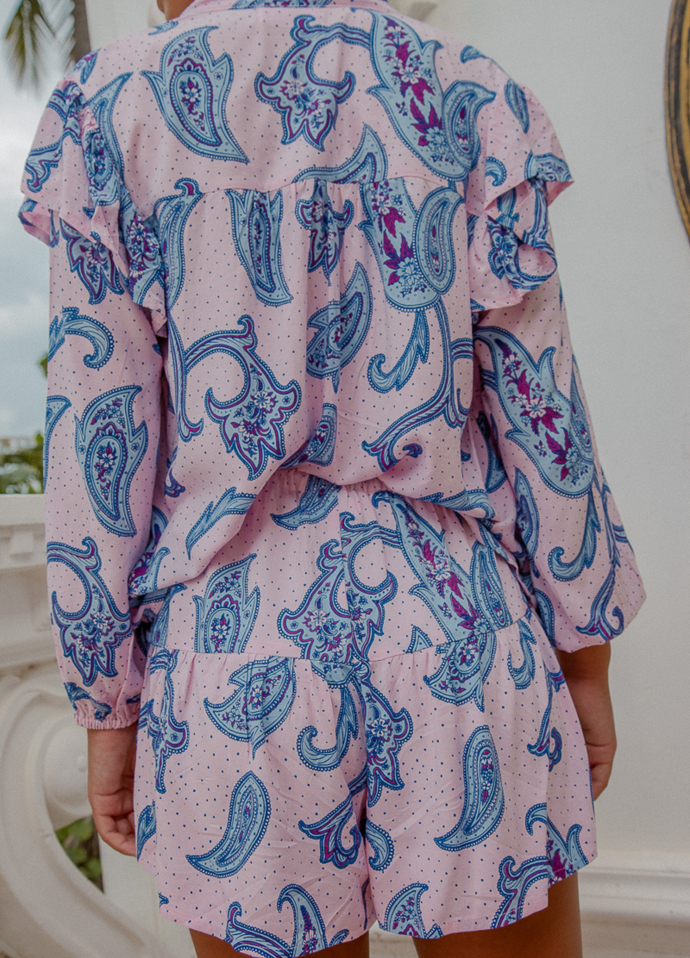 Model wearing the Oasis Paisley Blouse 