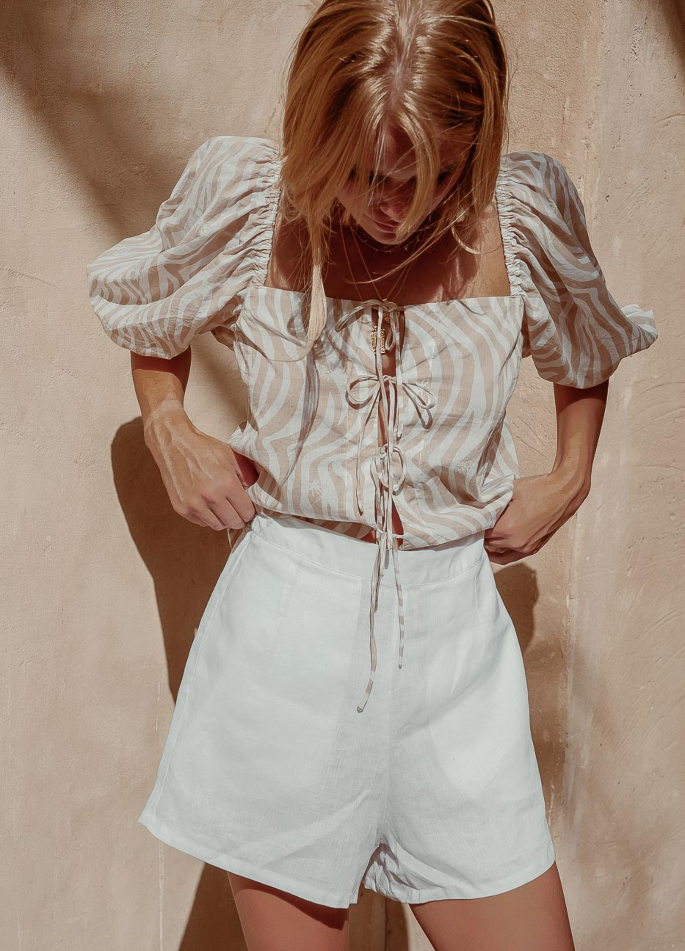 Model wearing the Linen Claudia Shorts from Palm Collective