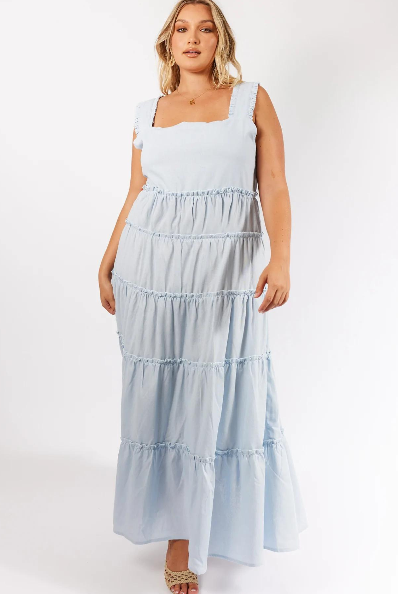Curvy Plus Size Model wearing the pale blue emery maxi dress with thick straps and tiered a line maxi skirt