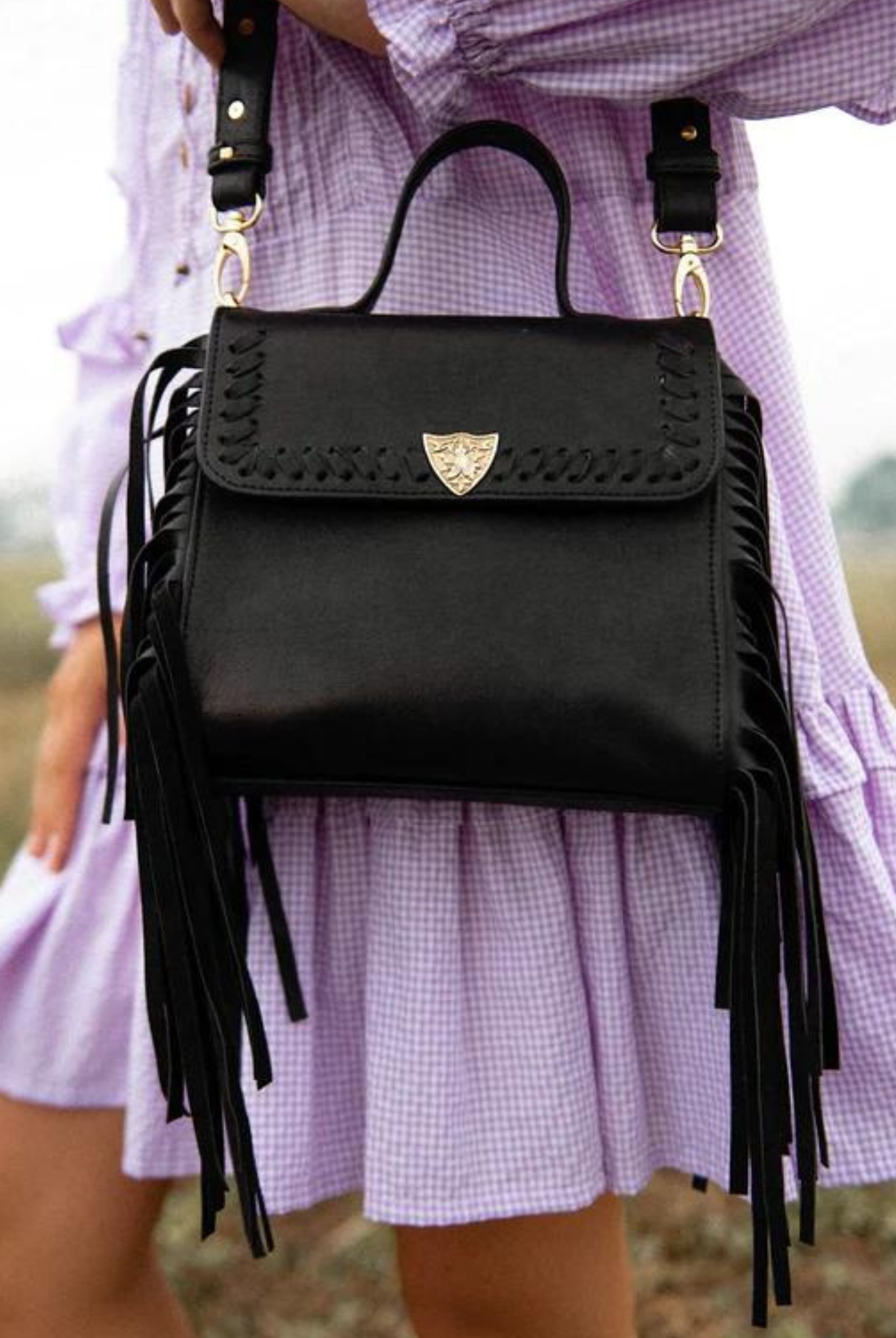 The Innerbloom black bag made in leather with fringing