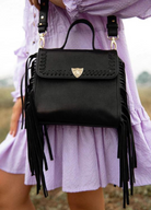 The Innerbloom black bag made in leather with fringing