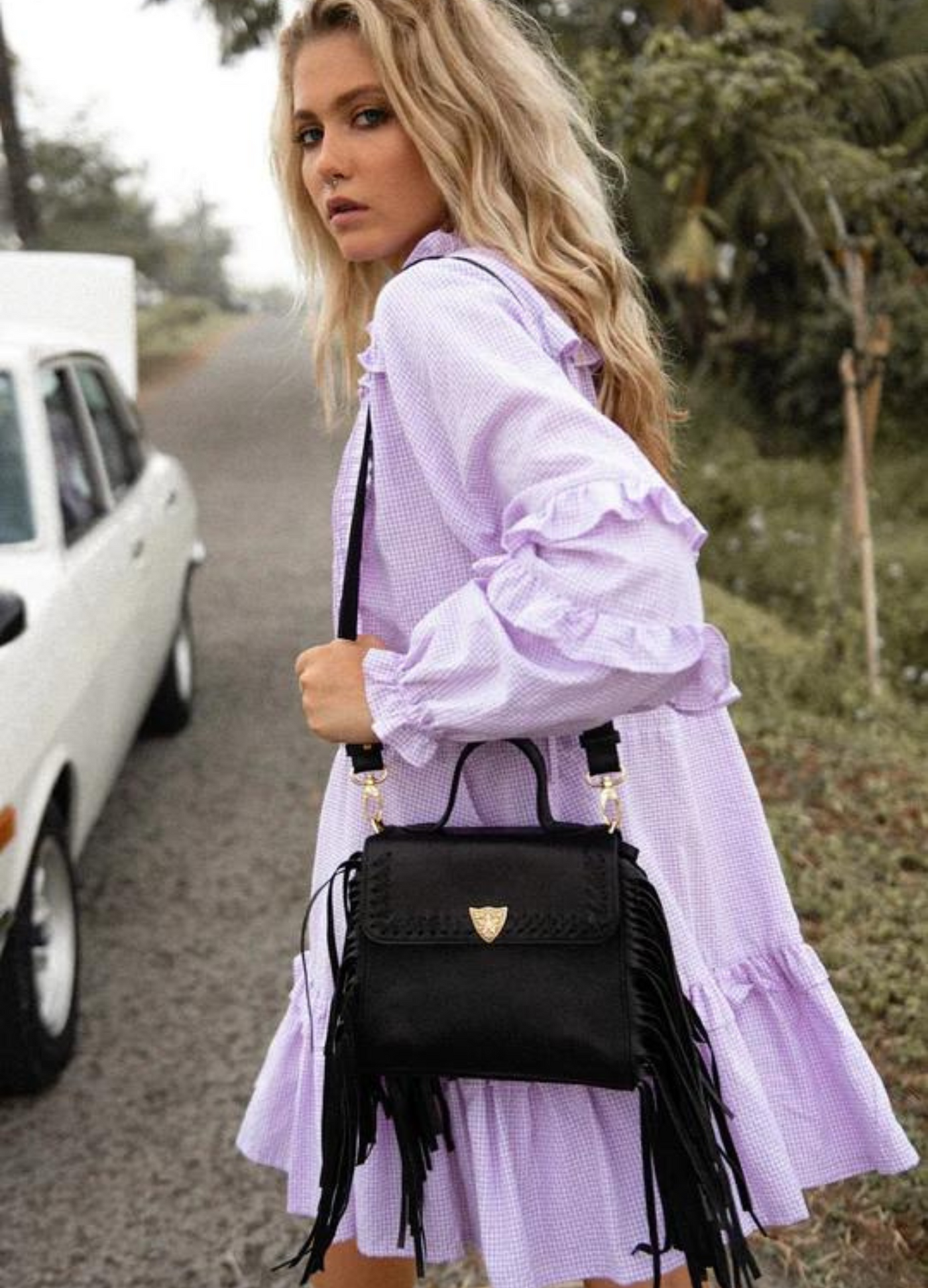 The Innerbloom black bag made in leather with fringing