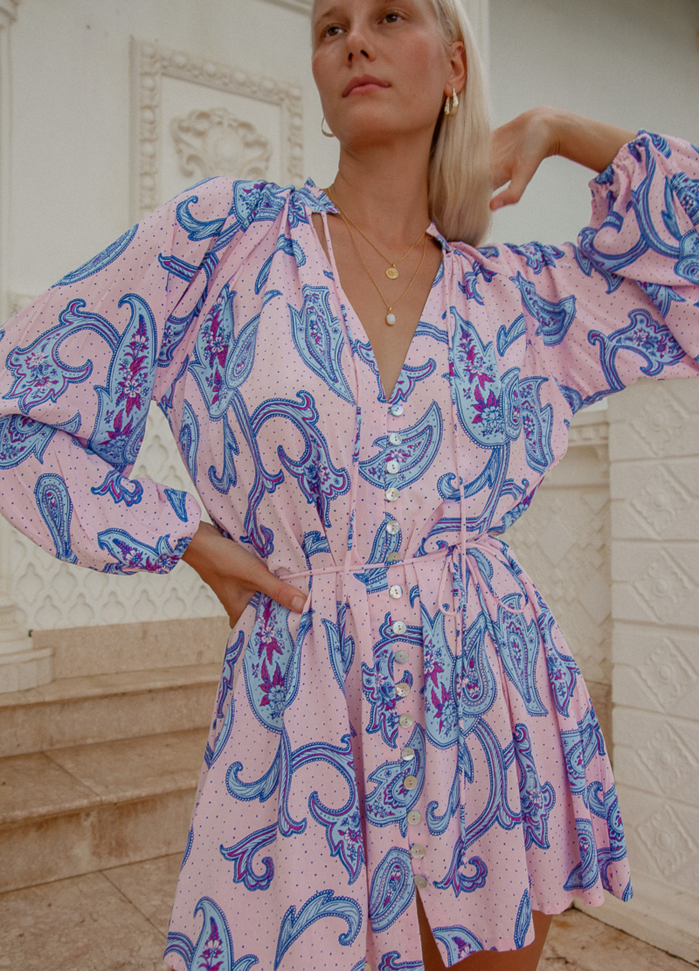 Model wearing the Palm Collective Paisley Mini Dress