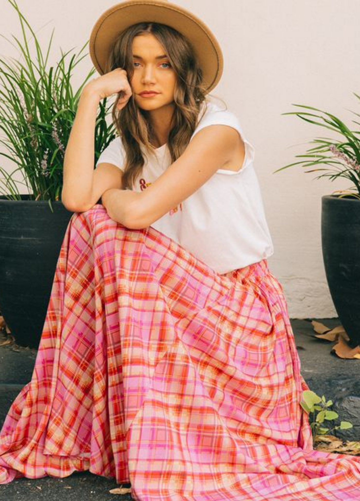 Pink Check Maxi Skirt with pockets worn in the photo with a white tshirt